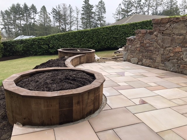 Completed patio with retaining wall